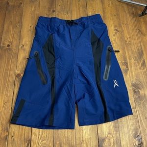 Priessei size small men’s biking shorts blue